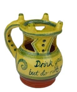 yellow and green puzzle jug