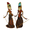 wayang golek rod puppets in brightly coloured costumes