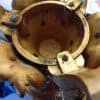 underside of brass candle stand showing construction
