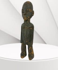 Side view of an original Lobi Bateba Phuwe fertility figure, hand-carved from dark wood, showing upright posture and pronounced facial features, approx. 26cm tall, against a plain white background.