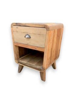 Handmade round bedside table with one drawer and shelf, crafted from reclaimed teak wood in Bali with rustic finish and natural colours.