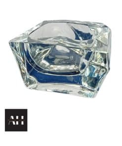 Mid-century Daum Glass crystal ashtray with free-form geometric design, clear crystal finish, and signed “Daum France,” photographed for Antiques and Homes.