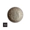 Close-up of 1915 Half Crown in good collectable grade showing George V portrait and aged silver tone