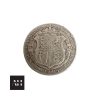 Close-up of 1918 Half Crown in very good collectable grade showing George V portrait and detailed silver patina.