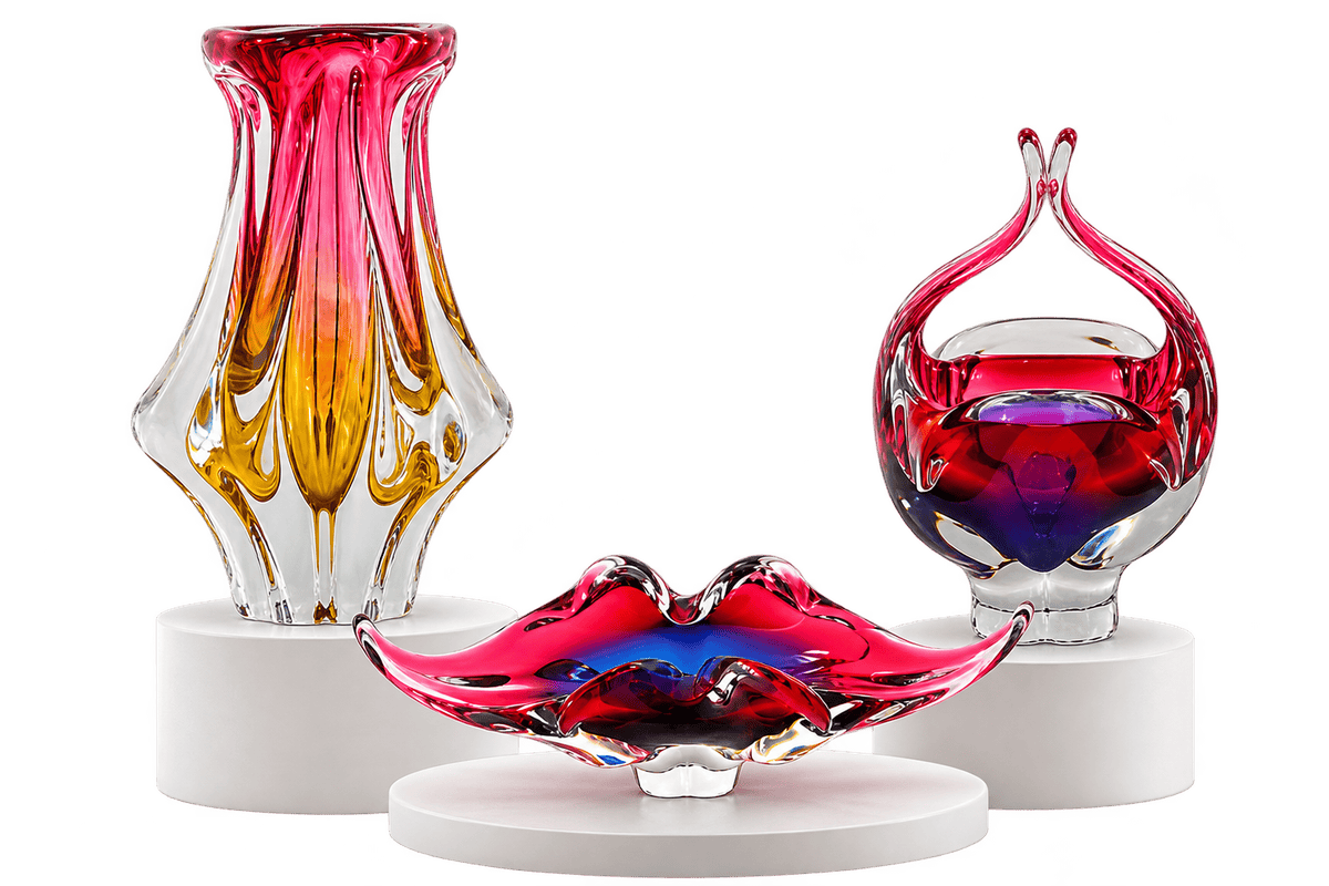 Josef Hospodka Chribska Glass collection showing sculptural vase, freeform bowl and handled basket forms