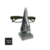 Close-up of Vintage Spectacles Holder in polished aluminium, nose-shaped glasses stand with quirky mid-century design.