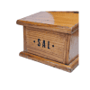 Close-up detail showing “Sal” lettering on a vintage Spanish salt box