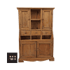 Front view of a shedowrk vintage miniature pine dresser with shelves, drawers and cupboard showing rustic character.
